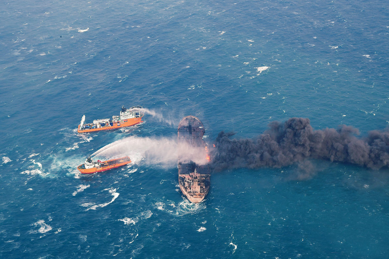 Firefighting boats attempt to put on a blaze on the oil tanker Sanchi in the East China Sea on January 10 before it sunk. Photo: AP